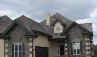 Two-storey home with a stucco and stone exterior